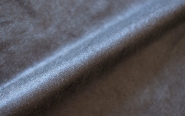 Black plain spunlace nonwoven fabric made from black viscose and polyester for beauty, apparel, and automotive applications