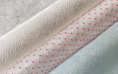 PVC dotted spunlace nonwoven material with anti-slip surface for wiping applications