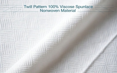 Twill pattern 100% viscose spunlace nonwoven material for premium disposable towels and personal care applications
